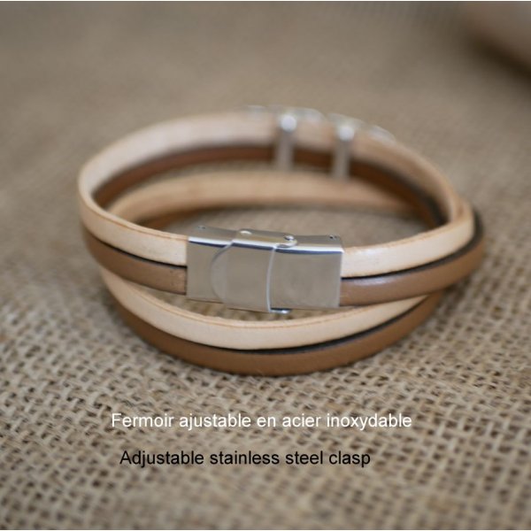 Doble correa de piel en d&uacute;o decorada con una pluma plateada