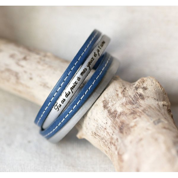 Correa de piel azul de doble costura con cierre magn&eacute;tico