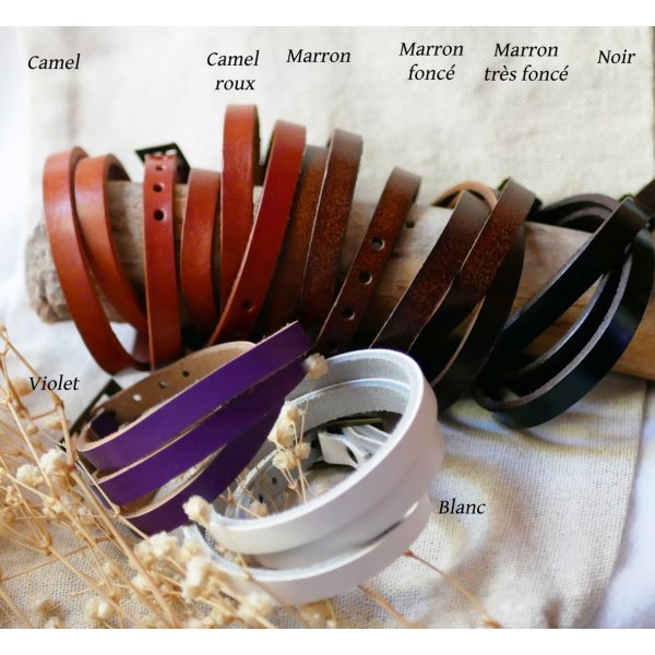 Reloj pulsera de piel con colgantes de plumas y perlas