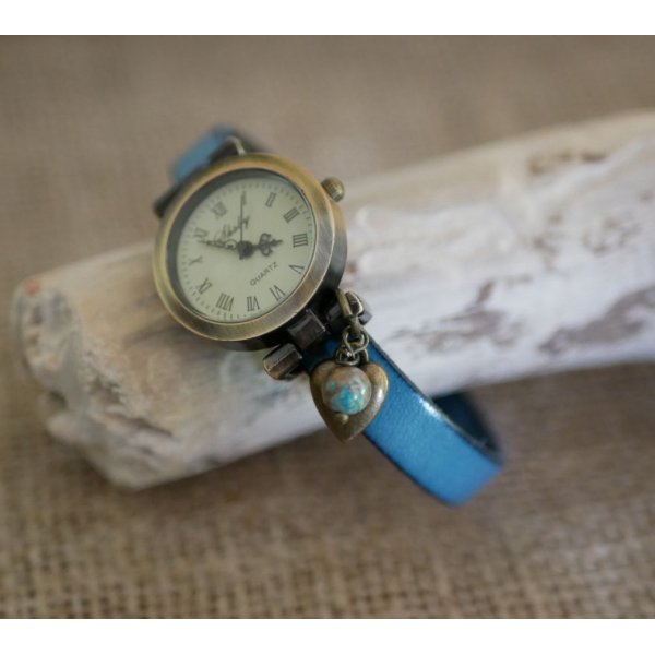 Reloj con esfera de bronce y correa de piel personalizable